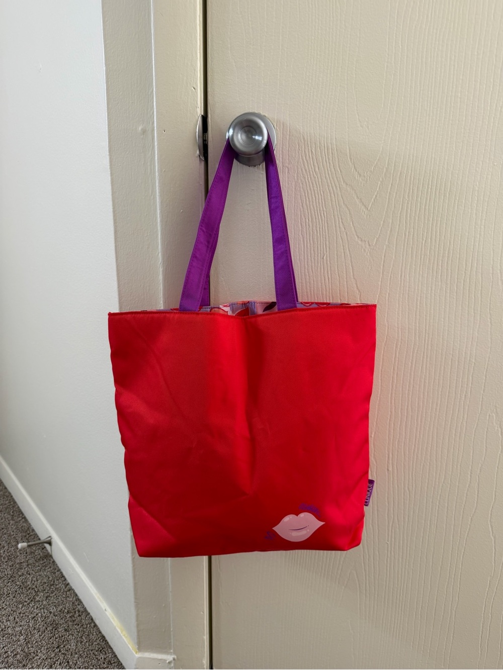 Clinique Red Tote Bag with Purple Handles